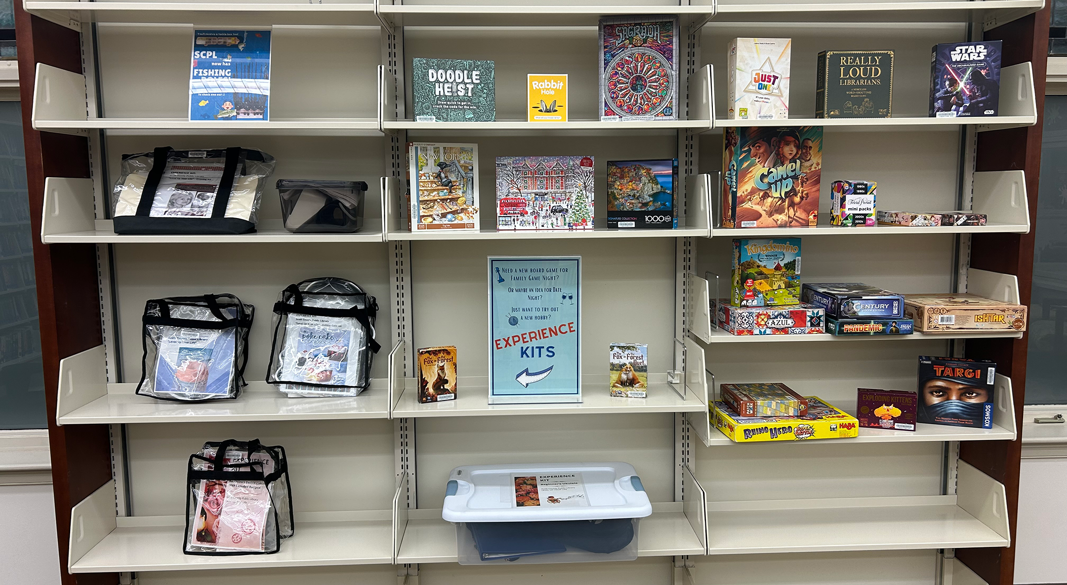 Experience kits and board games on shelves