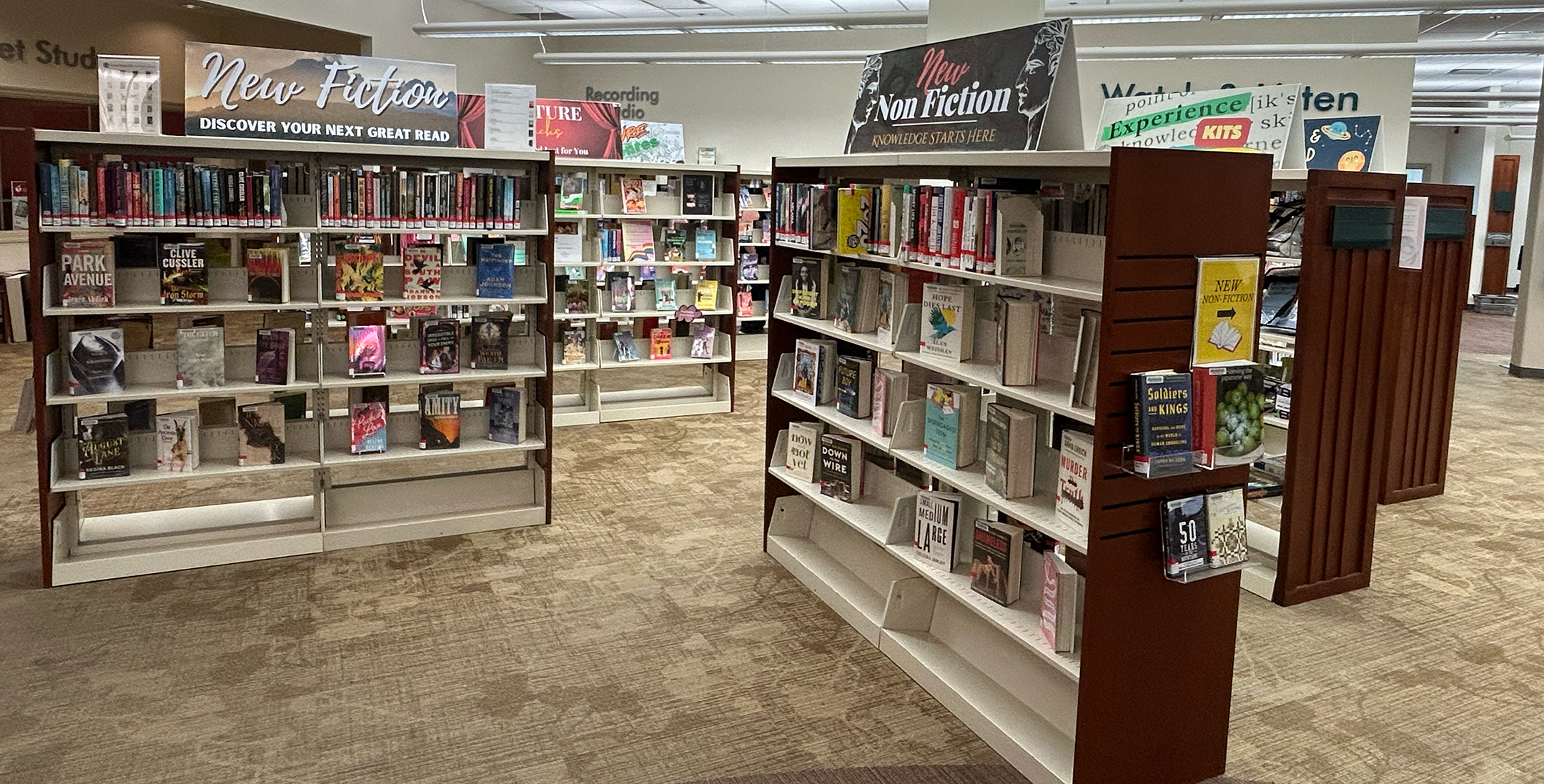 Experience kits and board games on shelves